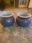 Porcelain pottery hand crafted Native American pair