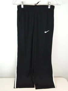 Jungen Nike Dri Fit schwarz mit weißen Streifen Größe Medium sportliche Kordelzughose - Bild 1 von 11