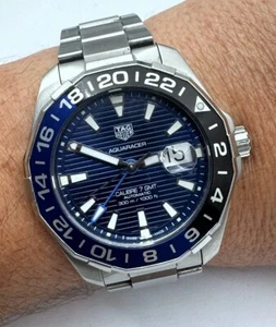 Tag Heuer Aquaracer 300M Automatik Kaliber 7 GMT schwarz blaue Lünette 43mm neuwertig - Bild 1 von 21