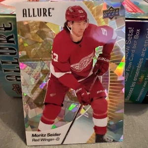 2023-24 Upper Deck Allure #86 Yellow Taxi Moritz Seider - Detroit Red Wings - Picture 1 of 2