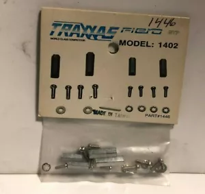 Juego de postes y tornillos adaptadores de montaje servo Traxxas 1446 para 1402 Fiero GTP NUEVO EN PAQUETE RADIOCONTROL - Imagen 1 de 1