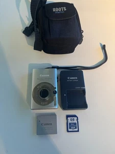 Neuwertige Canon PowerShot SD1100 IS 8.0MP Digital ELPH Kamera mit Akku Ladegerät SD-Karte - Bild 1 von 11
