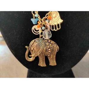 MIDDLE EASTERN GOLDTONE HAMSA HAND ELEPHANT NECKLACE - Picture 1 of 5