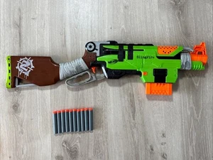 Nerf N-strike Elite Zombie Strike Slingfire Blaster, 6 cargador redondo y dardos - Imagen 1 de 11