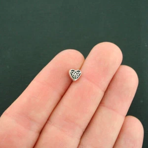 25 cuentas espaciadoras de corazón celta 2 caras 6,5 mm x 6,1 mm - SC7572 - Imagen 1 de 2