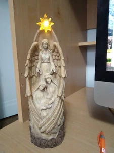 Sacra Famiglia in legno intagliato a mano come resina con angelo 11" x 3,75 - Foto 1 di 7