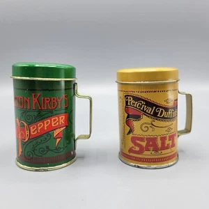 Salz- und Pfefferstreuer aus Blech mit Griffen Elton Kirby & Percival Duffins - Bild 1 von 8