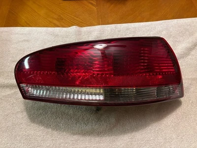 2005 CHRYSLER SEBRING CONVERTIBLE DRIVERS /LH TAIL LIGHT.  GENUINE OEM.  2001-06 - Image 1 of 4