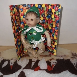 VINTAGE ASHTON-DRAKE GALLERIES  "I MELT FOR NO ONE" GREEN M & M VINYLE BABY DOLL - Picture 1 of 4