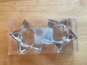 Candelabros votivos en forma de estrella. Vidrio transparente. Un par - Imagen 1 de 2