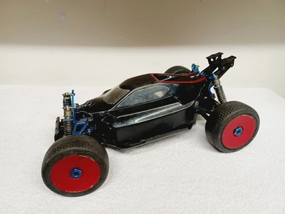 VINTAGE OFNA / DURATRAX / KYOSHO / MUGEN RC 1/8 NITRO 4WD BUGGY PARTS CHASSIS - Image 1 of 4