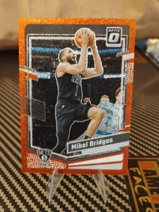 2023-24 NBA Donruss Optic - Mikal Bridges /75 #199 - Red Sparkle Nets Suns - Bild 1 von 3