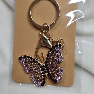 Schlüsselanhänger Damen lila schwarz Strass Schmetterling Taschenanhänger Kristalle goldfarben - Bild 1 von 5