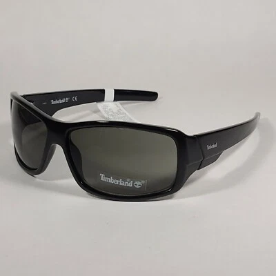 Gafas de sol Timberland TB7092 01N deportivas envolventes marco negro brillante lentes verdes 65 mm Foto 1 de 4