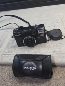 Minolta Hi-Matic AF2 fotocamera punta e scatta pellicola 35 mm FUNZIONANTE - Foto 1 di 19