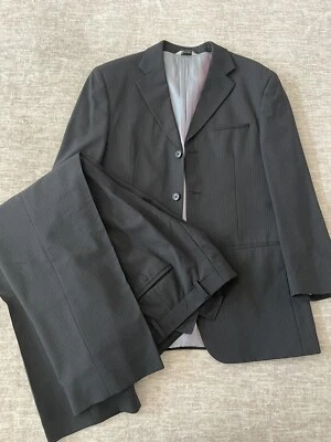 Traje chaqueta y pantalón Wilke Rodriguez para hombre a juego rayas negras 38R 32 X 30 Foto 1 de 4