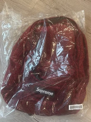 Mochila Supreme FW25 Logo Cremallera Terciopelo Rojo Leopardo Talla Única en Mano Foto 1 de 4