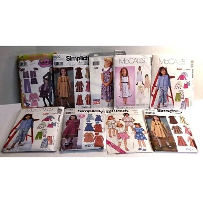 Lot of 9 Girls' Girl's Used Sewing Patterns Sizes 2 to 8 - Image 1 of 4