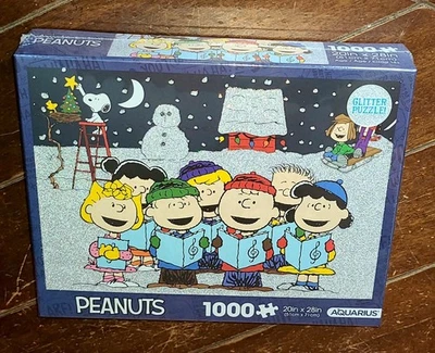 Aquarius PEANUTS CAROLING 1000pc 20" x 28" Glitter Puzzle (2024) #65570 - Image 1 of 3