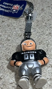 G721~ Player Keychain Lil’ Sports Brat Official NFL LAS VEGAS RAIDERS Football - Bild 1 von 6