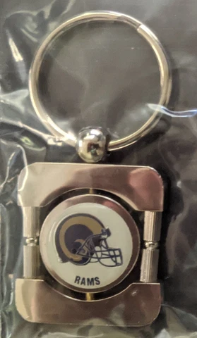 LOS ANGELES/ST LOUIS RAMS Chrome Rotating Logo Key Ring NFL Licensed *NEW* Cover