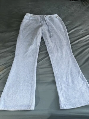 Pantalones deportivos grandes Champion con cordón azul claro cintura elástica para niñas Foto 1 de 3