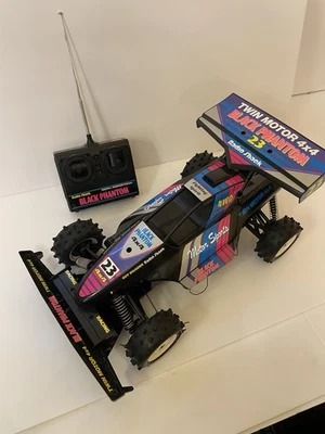 Coche de radiocontrol vintage Radio Shack negro Phantom 4x4 doble motor Japón para piezas/reparación Foto 1 de 4
