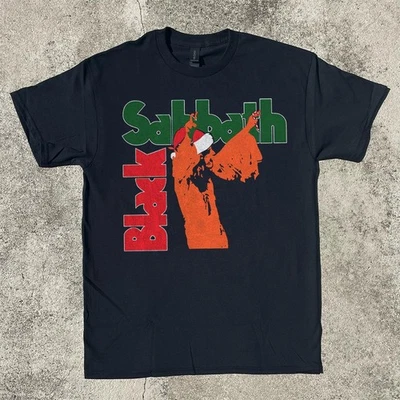 Camiseta Unisex Negra Algodón Pesado Navidad Sábado Negro Talla S-5XL Foto 1 de 4