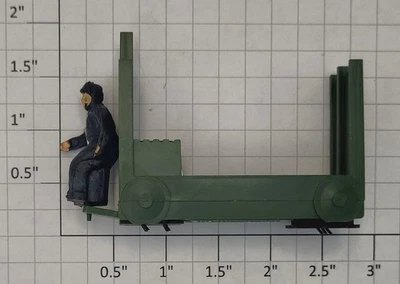 Lionel 356-35 Dark Green Baggage Cart Truck with Figure - Image 1 of 4