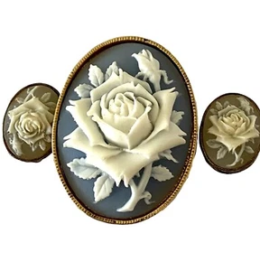 Broche de bufanda colgante y pendientes vintage de Nina Ricci para cameo floral azul Avon - Imagen 1 de 7