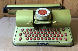 Máquina de escribir Berwin Gold estampado occidental juguete litográfico de hojalata vintage 11 x 7 x 5 - Imagen 1 de 4