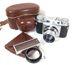 Voigtlander Prominent I con obiettivo Ultron 50mm F2 e prossimetro II in custodie - Foto 1 di 24