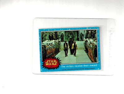 1977 Topps  -Star Wars Series 1 Blue Card # 54 -The victors receive their reward - Image 1 of 2