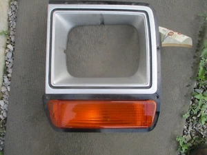 86-90 Dodge Ram Pickup LH Headlamp Bezel w/Park Lamp SILVER Used - Picture 1 of 5