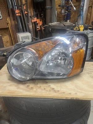 Conjunto de faros 320-1116L-AC7 para Subaru Impreza y WRX del lado del conductor 2004 Foto 1 de 3