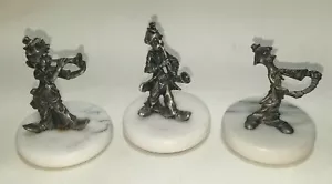 3 payasos de peltre sobre una base de mármol - Imagen 1 de 12