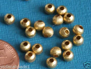 100 cuentas de cepillo redondo chapadas en oro de 4 mm - Imagen 1 de 2