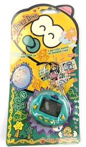 NOS Dinkie Dino Raku Raku DinoKun japanisches virtuelles Haustier TK-910 grün Tamagotchi - Bild 1 von 9