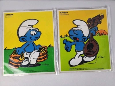 Rompecabezas de los Pitufos 1982 Vintage Playskool Milkings Hecho y Noche Serenata Foto 1 de 4