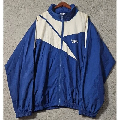 Chaqueta cortavientos vintage Reebok de nailon para hombre talla XL azul Foto 1 de 4