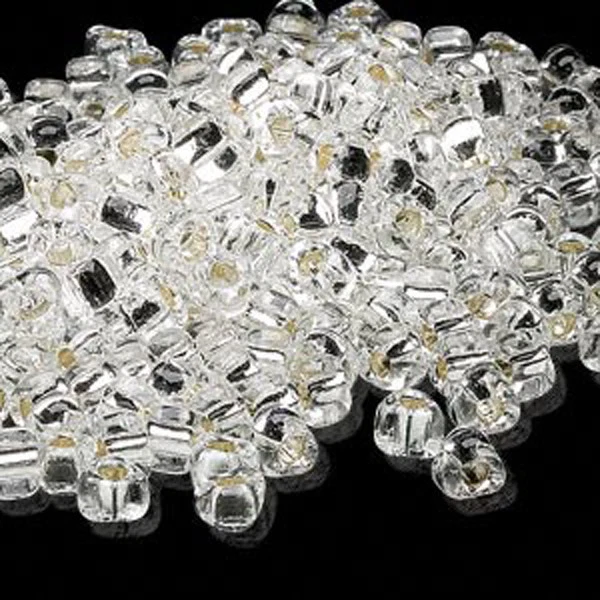 100 cuentas de semillas triangulares de vidrio Miyuki 5/0 cuentas transparentes forradas en plata Foto 1 de 1