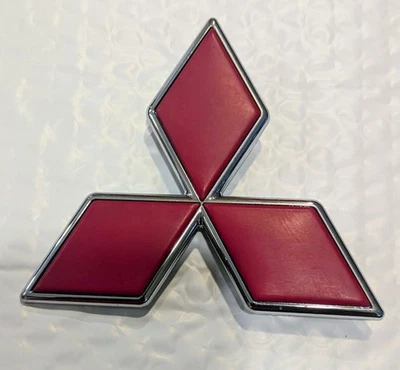 2000 Mitsubishi Montero Front Grille Badge Emblem Logo "Red" Adhesive Supplied  - Image 1 of 4