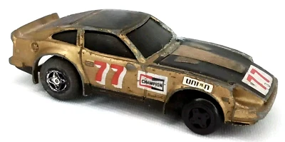 Vintage Die-Cast Metal Car Datsun 280ZX 77 Gold & Black Ideal Toy Corp 1982 - Image 1 of 4