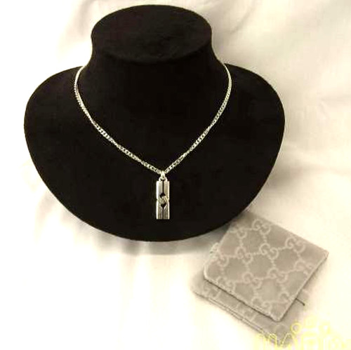 Collana con ciondolo GUCCI in argento sterling 925 nodo infinito usata