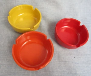 VINTAGE MID CENTURY HARD PLASTIC  ASHTRAYS  1 YELLOW, 1 DARK RED, 1 ORANGE 3 PCS - Picture 1 of 3