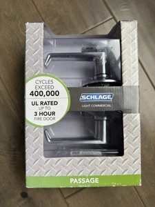 Manija de puerta de paso comercial Schlage Light palanca Elan acabado cromado satinado nueva en caja - Imagen 1 de 5