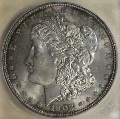 1902-P Morgan Silver Dollar ICG MS65+ Mostly Toned with rainbow around the rim - Image 1 of 4