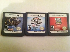 Nintendo DS games Marvel Super Hero Squad, The Golden Compass, Guitar Hero KID! - Picture 1 of 5