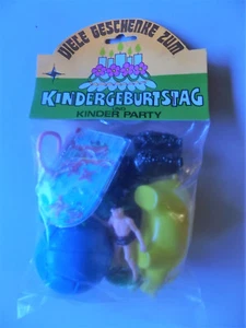 VINTAGE BEUTEL GESCHENKE KINDER PARTY SPIELZEUG WUNDERTÜTE -  1970er TARZAN NEU - Picture 1 of 2