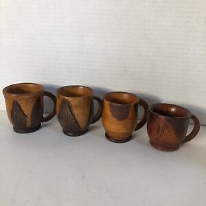 Four wooden Cups Unmarked Handmade?